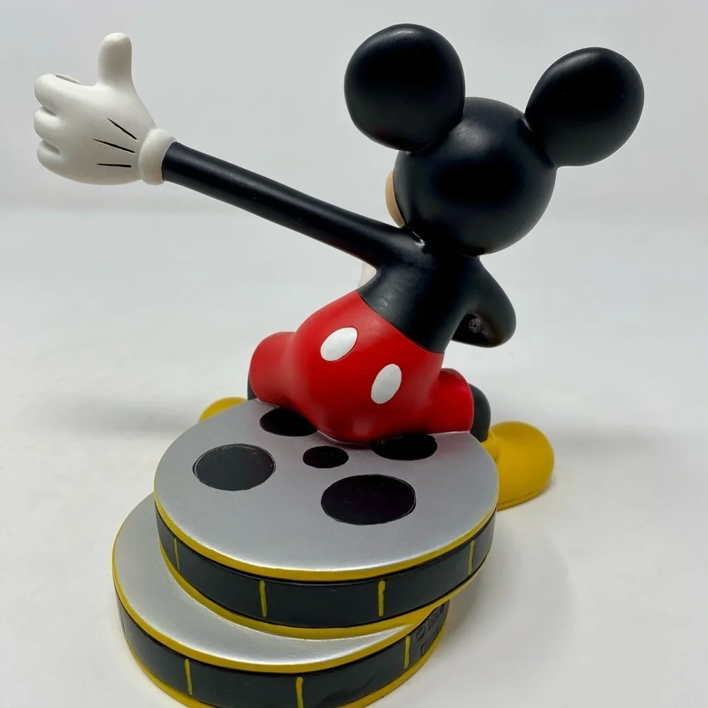 VINTAGE DISNEY, OVERLAND PARK KS66214 MICKEY SITTING ON FILM REELS